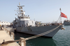 The U.s. Navy Patrol Boat Uss Firebolt (pc 10) Sits Moored In Port Displaying The Image