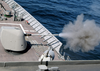 A Cloud Of Propellant-gas Discharge Is Expelled From The 5-inch Gun Aboard The Aegis Cruiser Uss Vella Gulf (cg 72) Image