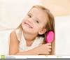 Girl Brushing Hair Clipart Image
