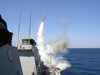 The Guided Missile Destroyer Uss Porter (ddg 78) Launches A Tomahawk Land Attack Missile (tlam) Toward Iraq During The Initial Stages Of Shock And Awe Image