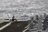 An Fa-18a Hornet  Launches From The Flight Deck. Image