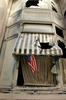 Flag On A Soot Covered Building Image