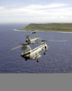 Two Uh-46  Sea Knights  And One Uh-60  Black Hawk  Fly Toward Guam As A Part Of A Six-helicopter Formation During Flight Training. Image