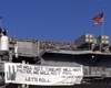 The Amphibious Assault Ship Displays A Banner From Her Stern Quoting President Bush:  We Will Not Tire, We Will Not Falter, We Will Not Fail Image