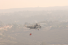 A Sea King Helicopter (uh-3h) Assigned To The Golden Gators Of Reserve Helicopter Combat Support Squadron Eighty Five (hc-85) Assists In Fire Fighting Efforts Throughout The Scripps Ranch Area Of San Diego Image