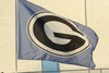 Waving Flag With Letter G On It Image