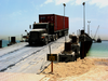 A U.s. Army Transport Vehicle Returns From The U.s. Navy Elevated Causeway System-modular Image