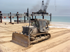 U.s. Navy Seabees Assigned To Amphibious Construction Battalions One And Two Continue To Smooth The Beaches For Future Operations In Preparation For The Completion Of The At Camp Patriot Image