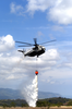 A Ch-53d Sea Stallion Assigned To Marine Heavy Helicopter Squadron Four Six Three (hmh-463) Performs Fire Fighting Drills Image