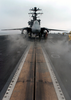 An F-14d Tomcat Assigned To The Tomcatters Of Fighter Squadron Three One (vf-31) Sits Poised For Launch On One Of Four Steam-powered Catapults Aboard The Nuclear Powered Aircraft Carrier Uss John C. Stennis (cvn 74). Image