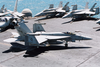 An F/a-18c Hornet Assigned To The Eagles Of Strike Fighter Squadron One One Five (vfa 115) Taxies To One Of Four Catapults Image