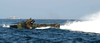 An Amphibious Assault Vehicle Embarked Aboard The Amphibious Assault Ship Uss Bataan Image