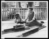 [j.n. Swartzell And Daughter Margaret Seated With Parts Of Electric Train, On Porch Of Home, Washington, D.c.] Image
