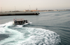 A Patrol Craft Assigned To Coast Guard Port Security Unit Three Zero Seven (psu 307) Leaves The Harbor To Monitor Activities Around Kuwait Naval Base. Image