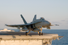 F/a-18c Hornet Launches From One Of Four Steam Powered Catapults On The Ship S Flight Deck Image
