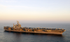 The Nuclear Powered Aircraft Carrier Uss George Washington (cvn 73) And Carrier Air Wing Seven (cvw-7) Transit The Straits Of Gibraltar Into The Mediterranean. Image