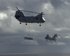 Two Ch-46 Sea Knight Helicopters Transfer Ordnance Image