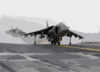An Av-8b Harrier Jump Jet Assigned To The  Tigers  Of Marine Attack Squadron Five Four Two (vma-542) Prepares To Takes Off From The Flight Deck Of The Amphibious Assault Ship Uss Bataan (lhd 5). Clip Art