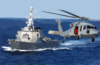 An Mh-60s Knighthawk Helicopter Flies By The Guided Missile Destroyer Uss John S. Mccain (ddg 56) Clip Art