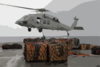 Storekeepers Assigned To The Aircraft Carrier Uss Kitty Hawk (cv 63) Supply Department S Stock Control Division, Hook Up Palletized Cargo To An Mh-60s Knighthawk Helicopter. Clip Art