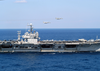 Two F-14 Tomcats Assigned To The  Black Lions  Of Fighter Squadron Two One Three (vf-213) Perform A Fly By Over Uss Theodore Roosevelt (cvn 71) Image