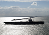 The Uss George Washington (cvn 73), Sails Past The Chesapeake Bay Bridge Tunnel On The Way To Sea, As It Prepares For The Composite Training Unit Exercise (comptuex) In The Atlantic Ocean Image