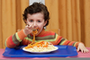 Child Eating Lunch Image