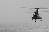 A Ch-46  Sea Knight  Helicopter Carries Supplies To The Mobile Bay During A Replenishment At Sea (ras) With The Uss Camden (aoe 2). Image