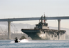 The Amphibious Assault Ship Passes Under The Coronado Bridge As She Makes Her Way Out Of The San Diego Bay Image