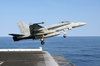 An F/a-18c Launches From One Of Four Steam-powered Catapults On The Ship S Flight Deck Image