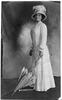 [woman Wearing Foot-lgth. Dress And Hat And Holding Umbrella With Tip On Floor.] Image