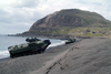 Amphibious Assault Vehicles (aavs) Line The Beach Below Mount Suribachi On The Island Of Iwo Jima Image