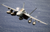 An F/a-18 Super Hornet Assigned To The Black Aces Of Strike Fighter Squadron Forty One (vfa-41), Flies Over The Western Pacific Ocean During Flight Operations Image