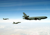 An F/a-18 And An F-14 Refuels With A U.s. Air Force Kc-135 Sratotanker Assigned To The 380th Aerial Refueling Wing Image