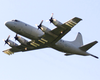 A P-3c  Orion  Attached To The  Tigers  Of Patrol Squadron Eight (vp-8) Heads To A Bombing Exercise Image