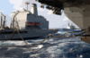 Uss Kitty Hawk (cv 63) Receives Fuel From The Military Sealift Command (msc) Replenishment Oilier Usns Rappahannock (t-ao 204) While The Destroyer Uss Paul F. Foster (dd 964) Approaches From The Rear. Clip Art