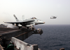 An F/a-18c Hornet Assigned To The  Stingers  Of Strike Fighter Squadron One One Three (vfa 113) Launches From The Flight Deck Aboard The Aircraft Carrier Uss Abraham Lincoln (cvn 72). Image