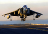An Av-8b Ii Harrier Lands On The Flight Deck Image