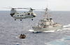 A Ch-46d Conducts A Vertical Replenishment Image