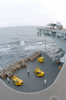 Supplies Are Loaded On To One Of Four Aircraft Elevators During A Replenishment At Sea Image