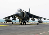 An Av-8 Harrier Taxis To The Ready Position Prior To Launching From The Flight Deck Of The Uss Bataan (lhd 5) In Support Of Operation Iraqi Freedom Image