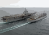 The Fast Combat Support Ship, Uss Detroit (aoe-4) Steams Alongside Uss Enterprise (cvn 65) While Conducting An Early Morning Replenishment At Sea (ras) Clip Art
