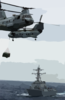 Two Ch-46d Sea Knight Helicopters Cross Paths While Transferring Cargo Clip Art