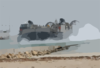 A Landing Craft, Air Cushion (lcac) Assigned To Assault Craft Unit Five (acu-5) Transports Equipment. Clip Art