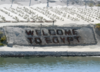 Welcome To Egypt Is Clearly Marked To Show That The Suez Canal Offers Safe Passage To Those Who Transit The Waterway, Which Is Used Daily By A Variety Of Ships, From Commercial Vessels To Military Warships. Clip Art