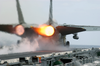 After Burners On An F-14 Tomcat Fire As The Aircraft Makes A Cataputl Launch. Image
