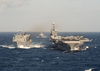 The Military Sealift Command (msc) Ship Usns Supply (t-aoe 6) Conducts A Replenishment At Sea With Uss George Washington (cvn 73) Image