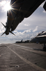 An F/a-18c  Hornet  Loaded With The Aim-9m  Sidewinder  Missile Rests On The Flight Deck Off Uss Kitty Hawk (cv 63) Image