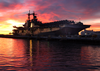 Uss Boxer (lhd 4) Rests Pierside With A Full Deck Of Aircraft Image