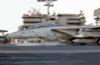 An F-14a Tomcat Launches From The Flight Deck Of Uss Kitty Hawk (cv 63) Clip Art